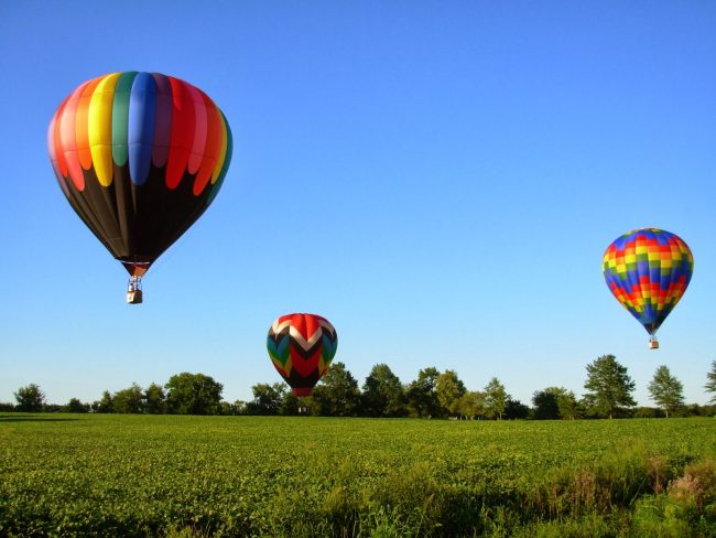 Hot air balloons are a great way to check out the island from above. Courtesy www.steuartholidays.com