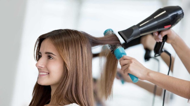 Blow drying can damage your hair in the long run. Image Credit: heatblowdry.com