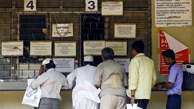 A man makes inquiries at a local tax office in India. Image credit: The New Indian Express