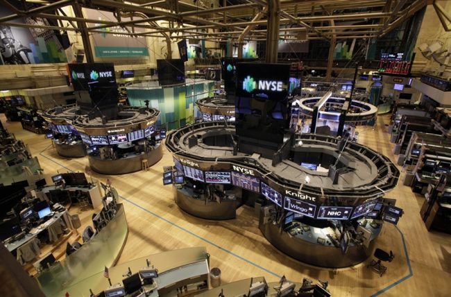 Devoid of any activity, the trading floor of the NYSE looks eery. Image credit: Richard Drew-AP
