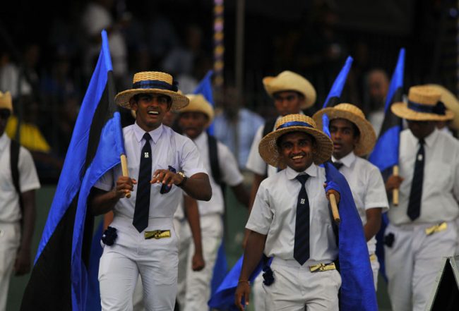 The undying devotion to your alma mater makes sense while you’re still young and in uniform, but thirty years later? Well… time to give the school colours a rest, eh boys? Image courtesy dailynews.lk