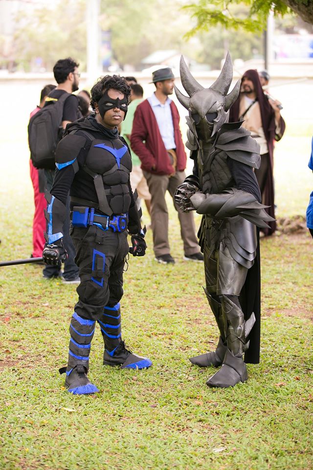 Chathurinda as Nightwing (the one with the blue emblem, to those of you unfamiliar with it) on the Lanka Comic Con Colombo tour. We can’t wait to see his Batman outfit too! (Take note of the creepy other guy by the way ‒ we will get to him in a jiffy). Credits: Ushan Gunesekera, Jehan Seedin