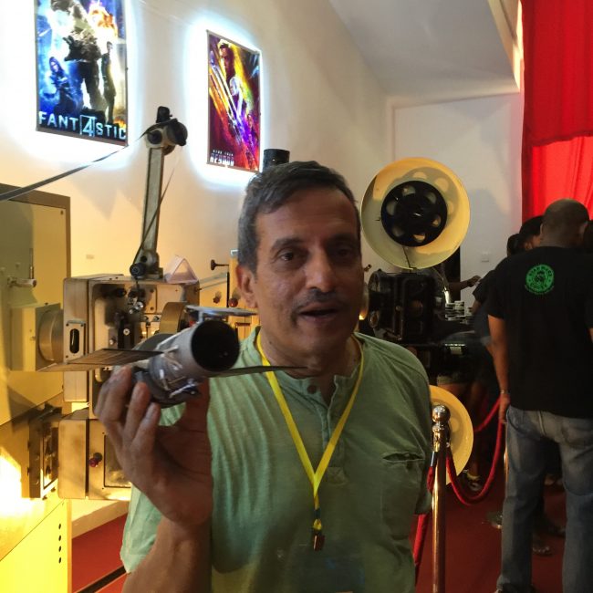 Dr. Kavan Ratnatunga with a model of the Hubble Space Telescope