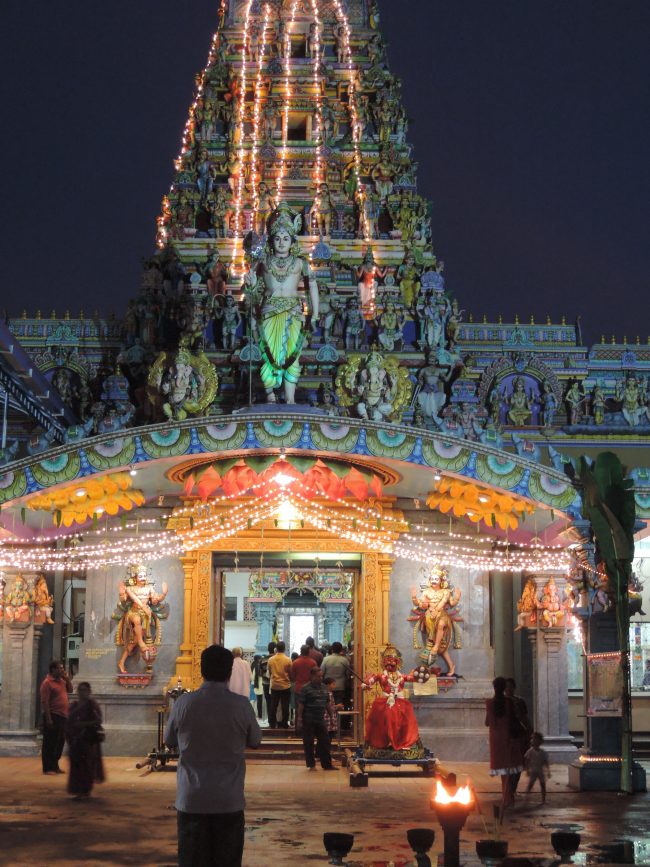 The entrance to the Kathiresan Kovil, lit up in honour of the six-day fasting period. 