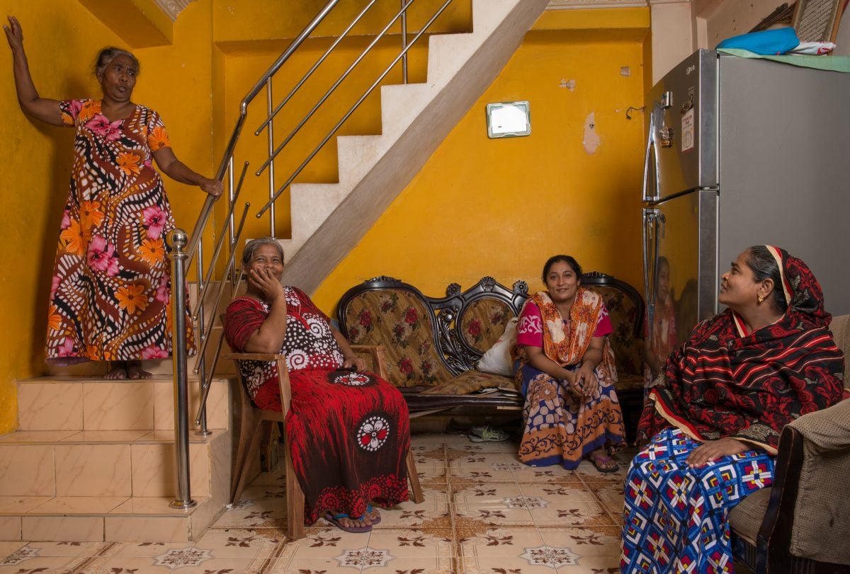 The sisters pose for a photograph in their living room. From left to right: Sareena, Naleefa, Nilufa and Rafeeka. Image credit: Roar.lk/Christian Hutter 