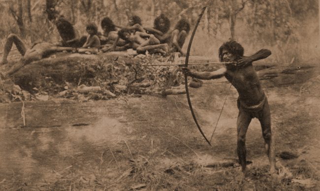 Veddah shooting with bow and arrow. Image courtesy Seligmanns.