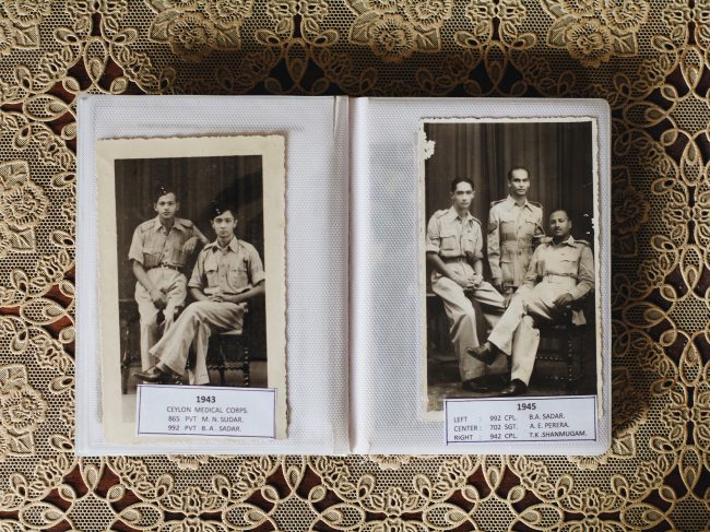 Photos of Sadar (seated, left) and his colleagues in uniform. Image credit: Roar.lk/Minaali Haputantri