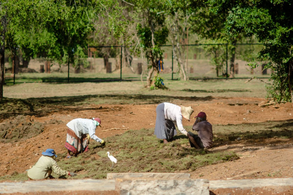 Labourers work on the landscaping of the park.